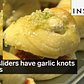 These sliders have garlic knots for buns