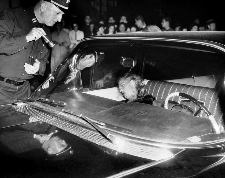Mob Moll, 1959: In the end, the mob moll suffered her own unhappily ever after when she was found shot to death in the front seat of a black Cadillac with mobster Little Augie Pisano in 1959.