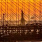 Statue of Liberty through the Brooklyn Bridge, New York