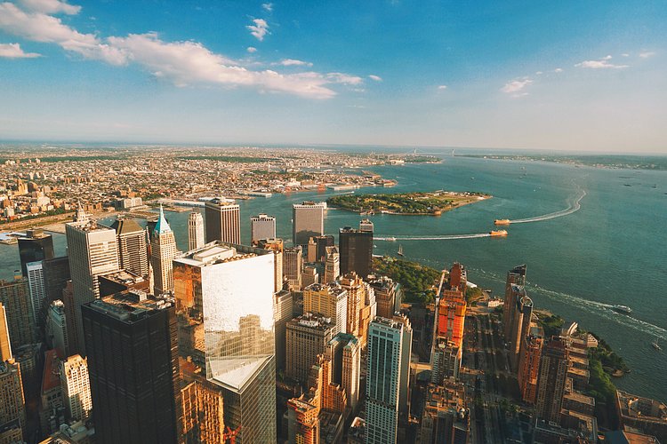 One World Trade Center Observatory View - New York City Skyline - South View | The views from the new observatory at the top of One World Trade Center (still lovingly referred to as the Freedom Tower ) are nothing short of breath-taking.

Taken yesterday over the span of an hour as the sky and the light changed drastically.

You can practically see the curvature of the earth from up there.

----


 Tons of information about my <a href="http://www.amazon.com/gp/product/1440339589/ref=as_li_tl?ie=UTF8&amp;camp=1789&amp;creative=9325&amp;creativeASIN=1440339589&amp;linkCode=as2&amp;tag=nyththle0e-20&amp;linkId=ER6GYT5FRYNMEPLF" rel="nofollow">New York photography book</a> with sample pages (including where to order and what stores are carrying it) here:

<a href="http://nythroughthelens.com/post/92873566010/ny-through-the-lens-the-book-i-am-super" rel="nofollow">NY Through The Lens: A New York Coffee Table Book</a>
---


View my New York City photography at my website <a href="http://nythroughthelens.com/" rel="nofollow">NY Through The Lens</a>.

View my Travel photography at my travel blog: <a href="http://travelinglens.me/" rel="nofollow">Traveling Lens</a>.

Interested in my work and have questions about PR and media? Check out my:

<a href="http://nythroughthelens.com/about" rel="nofollow">About Page</a> | <a href="http://nythroughthelens.com/PR" rel="nofollow">PR Page</a> | <a href="http://nythroughthelens.com/media" rel="nofollow">Media Page</a>