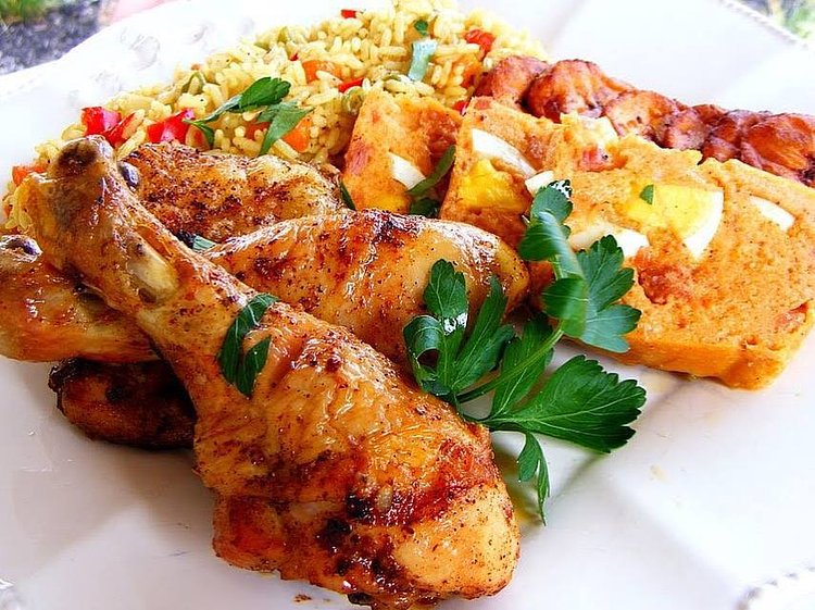 Moi Moi (and chicken) is a Nigerian steamed bean pudding dish