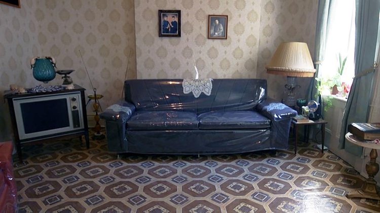 New exhibit looks inside the building where three families gained a foothold in the U.S.