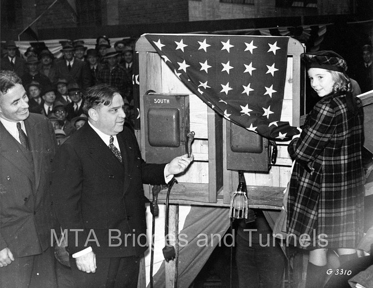 In 1939, NYC Mayor Fiorello La Guardia pulled the switch that blasted the last bits of rock that needed to be removed to complete the tunnel.