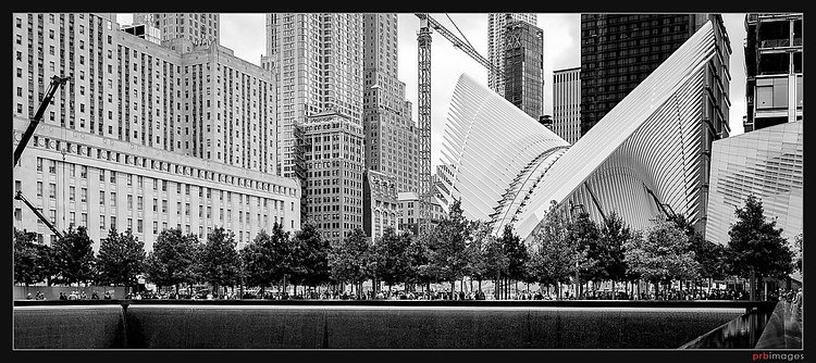 9/11 Memorial and the Oculus | The 9/11 Memorial and the Oculus, part of the World Trade Center Transportation Hub, New York.

<a href="https://www.flickr.com/cameras/sony/ilce-7m2/">Sony A7II / ILCE-7M2</a>
Sony FE 16-35mm F4 ZA OSS
31mm; 1/60 sec; f/5.6; ISO 250

See my related albums: <a href="https://www.flickr.com/photos/prbimages/albums/72157660601330572/">New York</a> ; <a href="https://www.flickr.com/photos/prbimages/sets/72157645653469528/">Black &amp; White</a> ; <a href="https://www.flickr.com/photos/prbimages/albums/72157645989124675/">Buildings &amp; Architecture</a>.