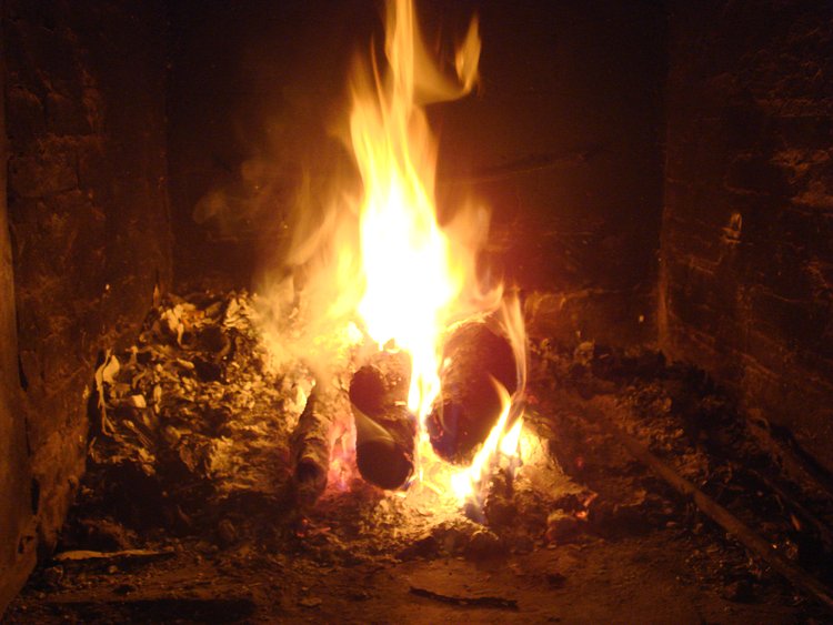 fireplace | burning fireplace in winter.
sittin' nearby in the armchair stretchin' out the foots, wearin'  heavy wool socks and drinking strong black, hot tea.
one lovely evening...