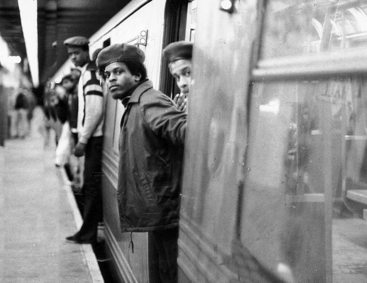 1980's: Members of the volunteer crime fighting organization, The Guardian Angels, patrol a subway car. The group was founded in 1979 in New York City in response to the increase in crime on the subway. 