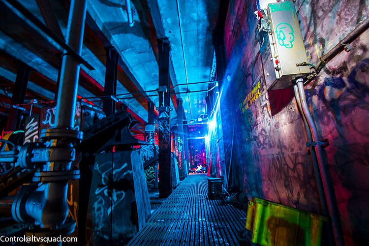 At the very end of the yard, the tracks dead end at the wall.