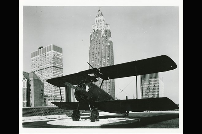 Here, a photo taken in 1969 of the newly installed plane replica. The fighter plane was placed on the roof while the building, which opened in 1970, was being constructed.