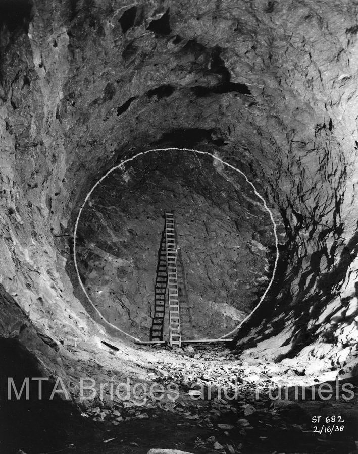 Part of the tunnel pre-excavation; the circle shows the chunk of rock that needed to be removed by explosives.