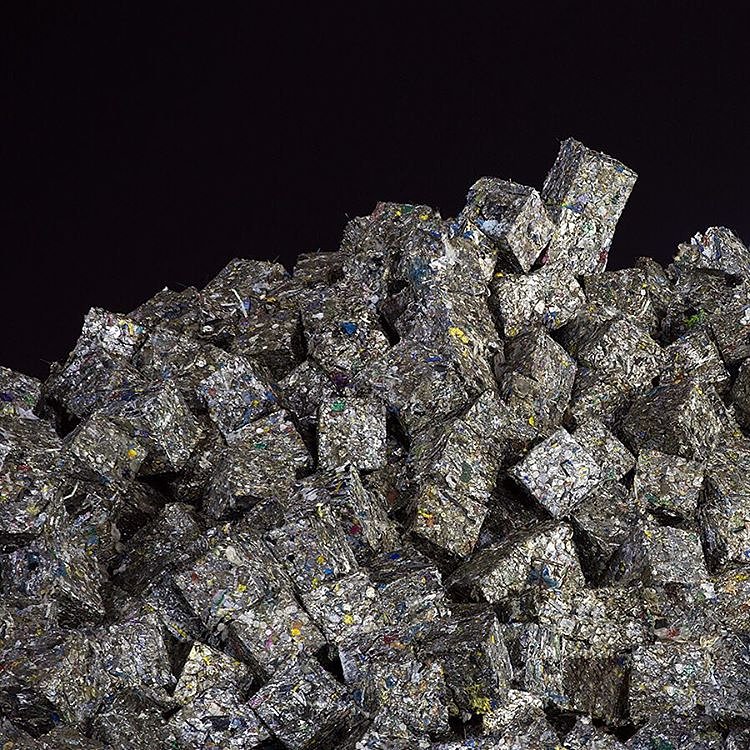 Can you guess what this is? It looks like a collapsed set of building blocks, but it's actually a huge pile of recyclable materials. At the @simsmuni facility in Sunset Park, machines separate New York City's metal, glass, and plastic, and then pack them into giant bales like you see in this photo from Instagram Ambassador @roofaccess. The bales then make their way to recycling facilities who complete the process by turning the materials into something new! To learn more about the @NYCRecycles process - and to see more of these great photos - tap the link in our bio.