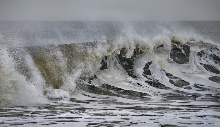 "If you ever dropped into a perfect wave, yet complained about the falling snow blurring your vision, then you know what it's like to surf in New York," Sean Kittle said.