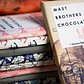 Mast Brothers Chocolate | Nathan Branch &copy;2010

Mast Brothers Chocolate is an artisanal chocolate company out of Brooklyn, New York, making chocolate in slow, delicate batches out of beans they've sourced themselves from small farms and co-ops around the world (they claim to be New York City's only "bean to bar" chocolate maker).