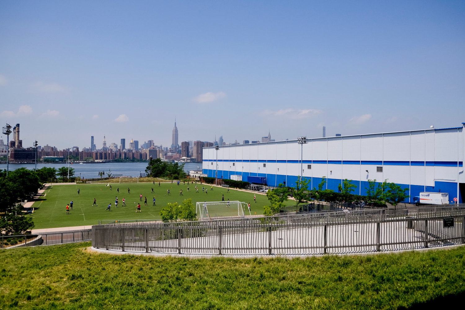 Abutting the waterfront in Williamsburg, the Bushwick Inlet Park consists of a five-acre playing field on what used to be a lot for rental trucks.