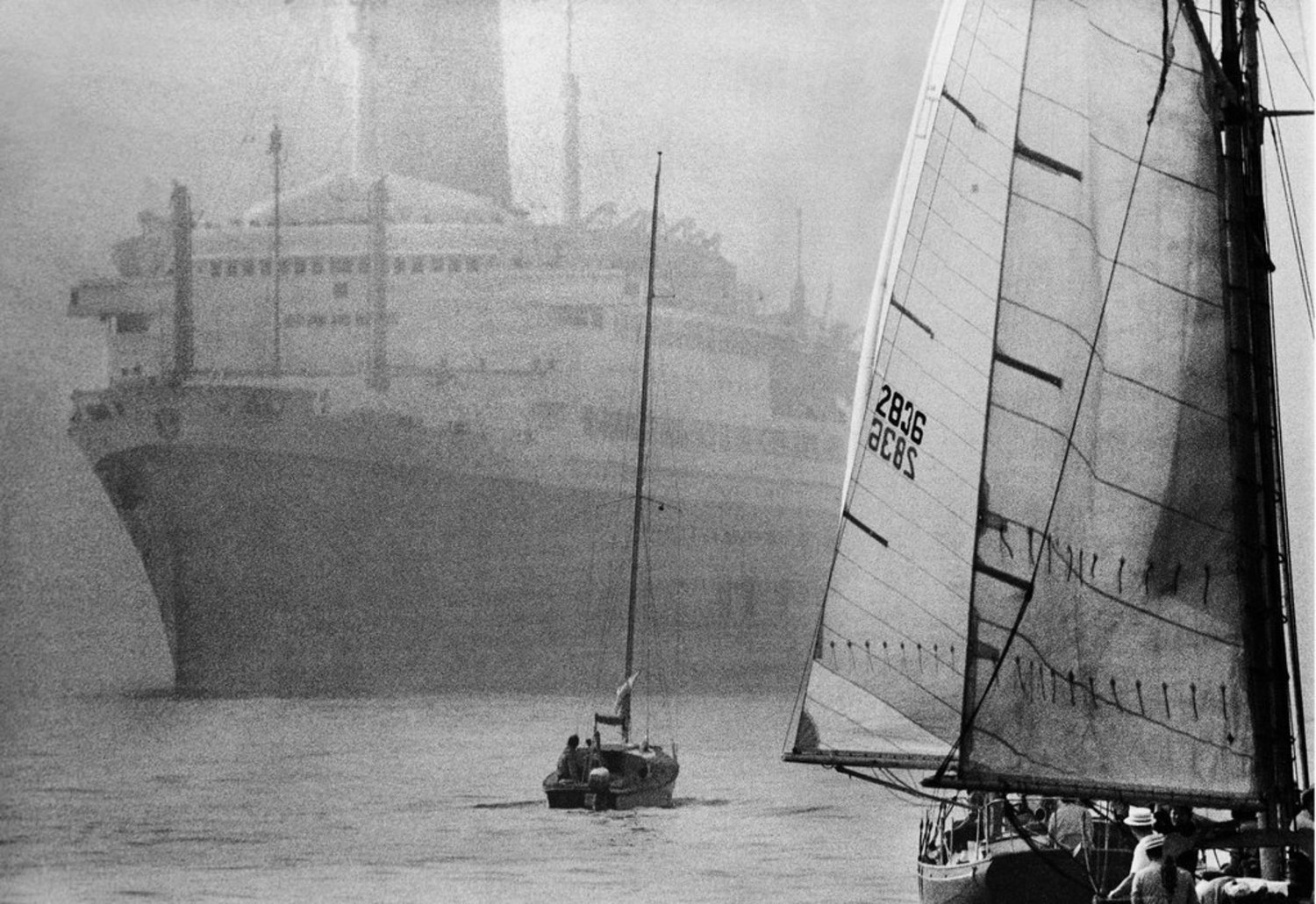 October 16, 1971: Sea vessels both huge and minuscule passed each other in New York harbor in the lead-up to the Mayor’s Cup schooner race. The enormous ship at the left and the tiny one in the middle did not compete (schooners have two or more masts) in the competition, which is held in October for its brisk winds and clear air. “Today did not oblige,” reported The Times. “For those in the spectator fleet, the full length of the starting line was barely visible through the fog.“