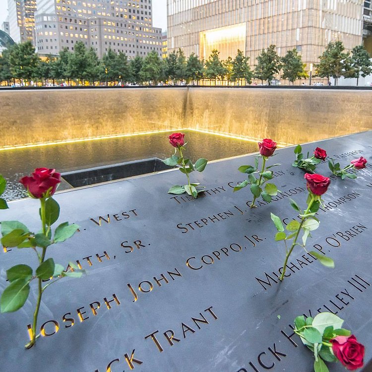 Remembering 9/11. "Reflecting absence" in the twin waterfalls and pool set within the original footprints of the World Trade Center's twin towers. Lower Manhattan, New York City.