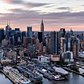 "The USS Kearsarge & USS Intrepid docked on the west side of Manhattan as the Empire State Building stands to attention during this morning's sunrise."