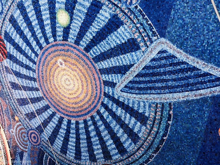 The vibrant blue designs are hypnotic.