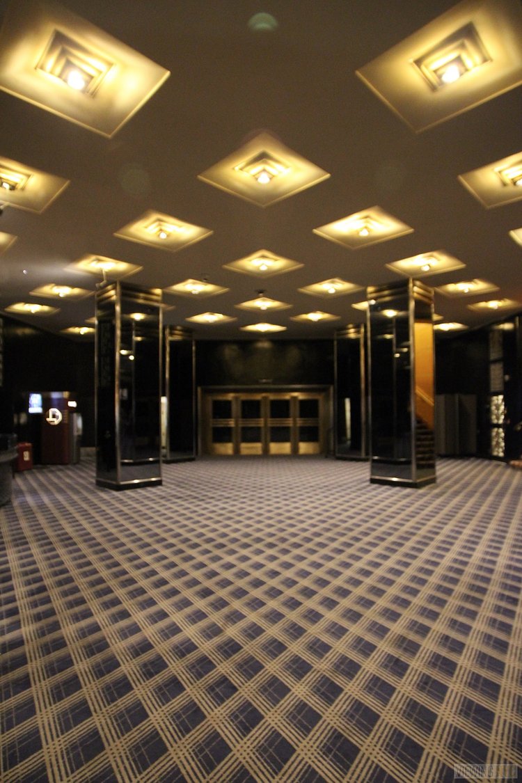 Basement Lobby | Built in 1932, Radio City Music Hall is a prime example of art deco architectural style that has withstood the test of time. With tons of gold, reflective surfaces and geometric design, walking through the venue is a bit like stepping back in time. Most of the fixtures, furniture and ornamentation are original, and any replacements are exact replicas of how the theater looked 80 years ago.

Read more here: <a href="https://viewing.nyc/i-braved-a-walkthrough-of-radio-city-music-hall-meant-for-tourists/" rel="nofollow">viewing.nyc/i-braved-a-walkthrough-of-radio-city-music-ha...</a>
