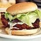 chicken sandwich with fries | <a href="http://piesnthighs.com/" rel="nofollow">Pies 'n' Thighs</a>

Fried chicken cutlet with lettuce, tomato, onion, avocado, with some...creamy sauce stuff. It's pretty great.