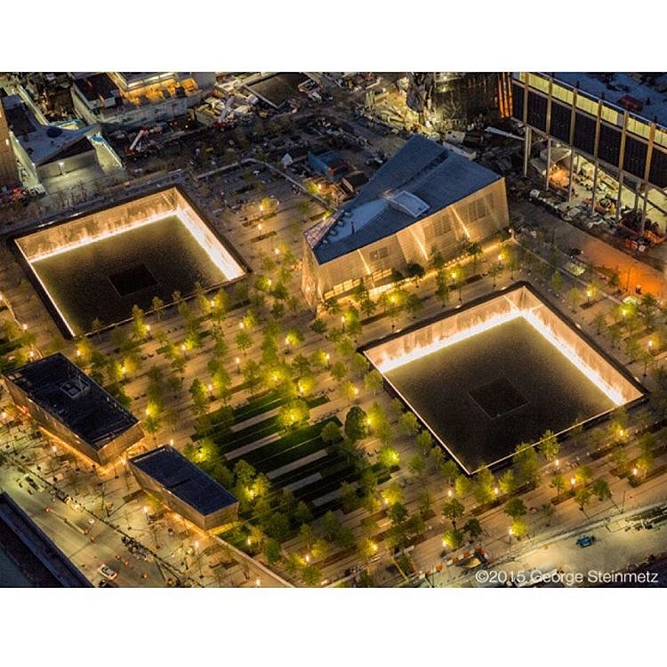 Photograph by George Steinmetz @geosteinmetz / @thephotosociety “Reflecting Absence” is the centerpiece of the 9/11 Memorial and has made the voids left by the destruction the primary symbols of our loss. How starkly this message is communicated depends on the time of year: when the plaza’s groves of sweet gum and swamp white oaks are in leaf, a sense of life flickers across the space.