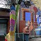 East Harlem resident Naomi RAG has continued to yarn bomb her neighborhood, enhancing it with color, warmth and intrigue.
