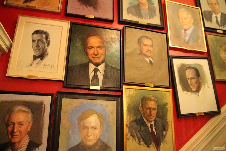 Portraits Along Staircase