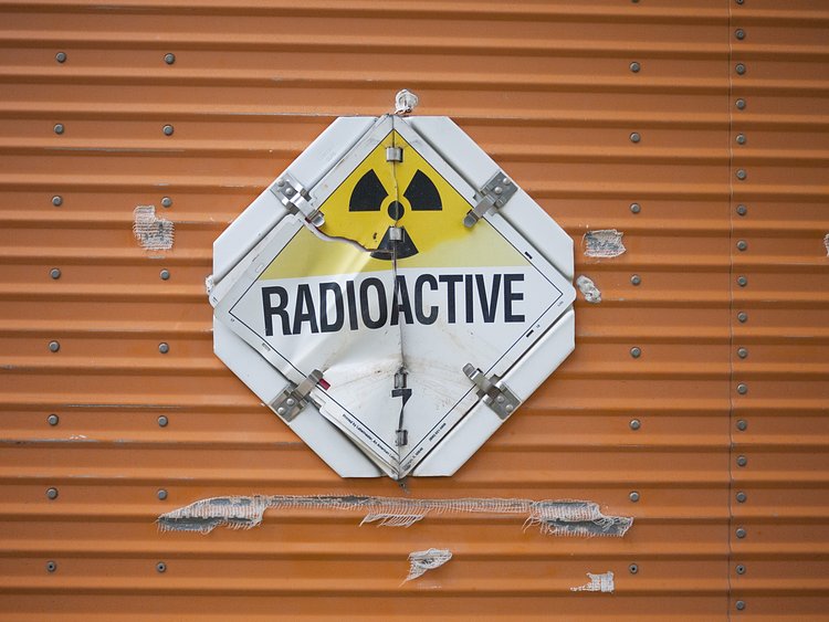 (unrelated "radioactive" sign, not on site)