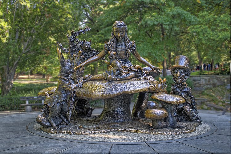 Alice in Wonderland, Central Park | A bronze sculpture depicting Alice in Wonderland in Central Park , New York.