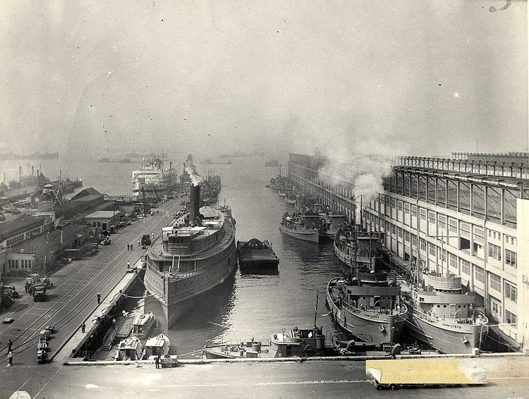 BAT was designed as an "inter-modal" shipping port, meaning supplies and people could move seamlessly between trains and ships. Train tracks led directly onto piers so troops and supplies could load onto ships with minimal delay. During World War II, the Terminal was used primarily to transport supplies and house the 60,000 workers who made the port of New York run.