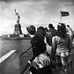 WWII refugee children viewing the Statue of Liberty as they enter the United States, 1946
