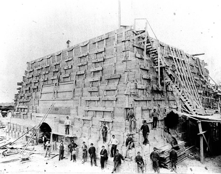 Workers at the monument's base, 1884. The United States was responsible for building and funding the pedestal, which stands at 154 feet, just a few feet taller than the statue.