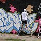 Graffiti artist working on a commissioned piece.
