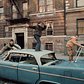 Kids playing on an abandoned car in South Bronx, 1970