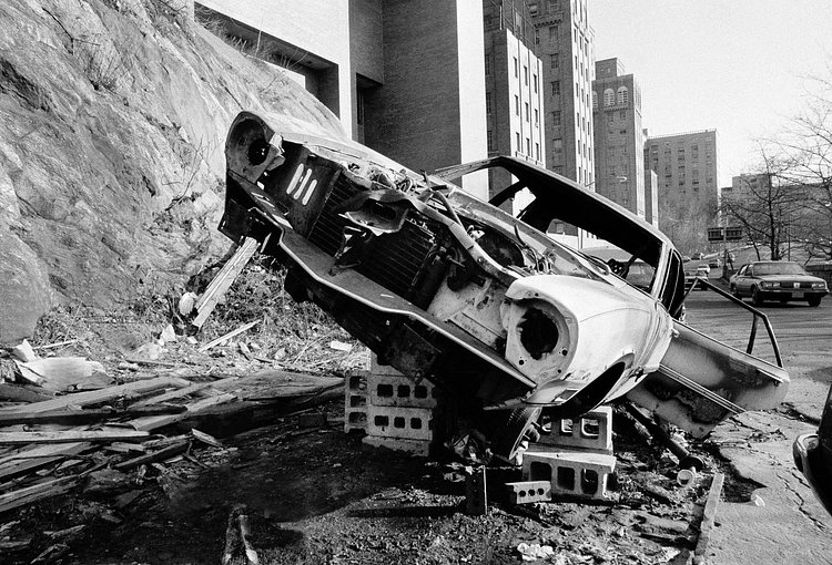 An abandoned car on Riverside Drive and 170th Street. March 15, 1984.