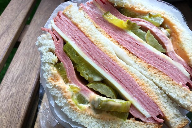 Olive Leaf Gourmet deli in Bedford-Stuyvesant is serving a "Trump Sandwich," made with white bread, "full of baloney," Russian dressing, "a small pickle," and "white American cheese."