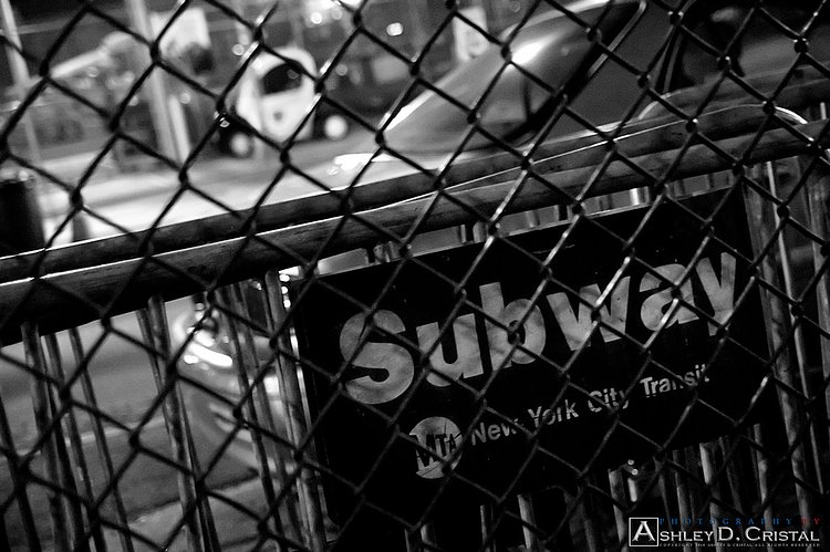 Subway Barricades | MTA barricades stored on the side of a street just outside the Mets-Willets Point Station across from the street from Citi Field after a Mets Yankees Subway Series game.

© 2010 Ashley D. Cristal, All Rights Reserved. Use of this photograph in ANY form is NOT permitted without permission from the author.