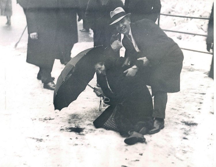 February 4 1936 Pedestrians help one another on slippery snowy sidewalks in New York photo Acme