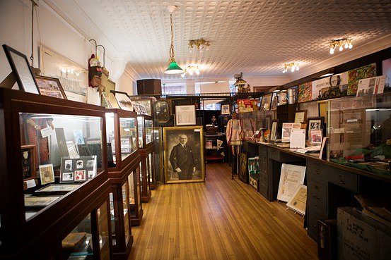 The Italian American Museum’s main room offers displays of antique items representing Italian American culture. 