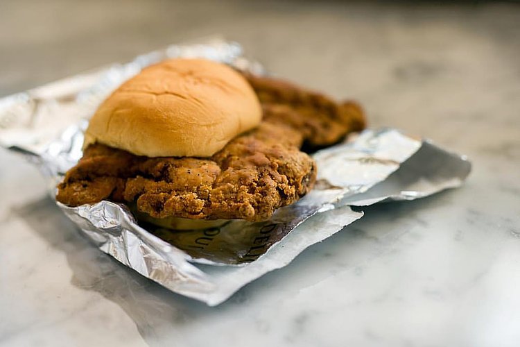 The Fuku #friedchicken sandwich by David Chang is a slab of crispy, juicy chicken with pickles and a buttered Martin's potato roll was pretty badass for $8.