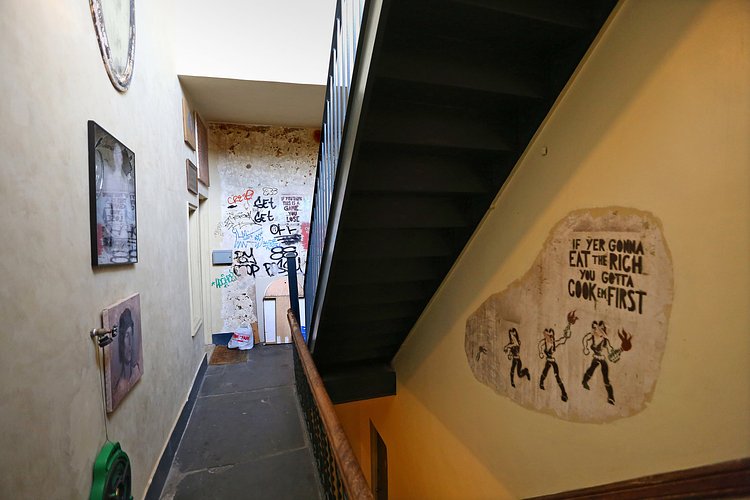 A sixth floor hallway, with remnants of the past.