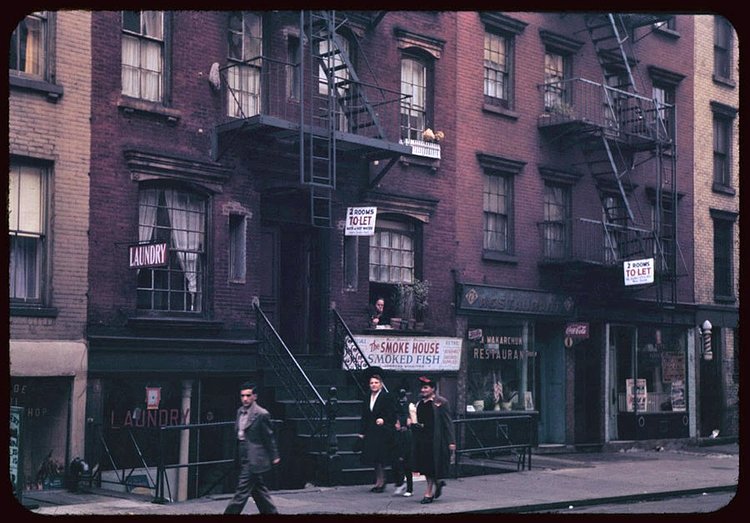 New Yorkers hurry along an undisclosed block between Avenues A and B in 1942.