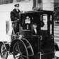 Woman passenger in a 1910 taxi cab, New York, USA