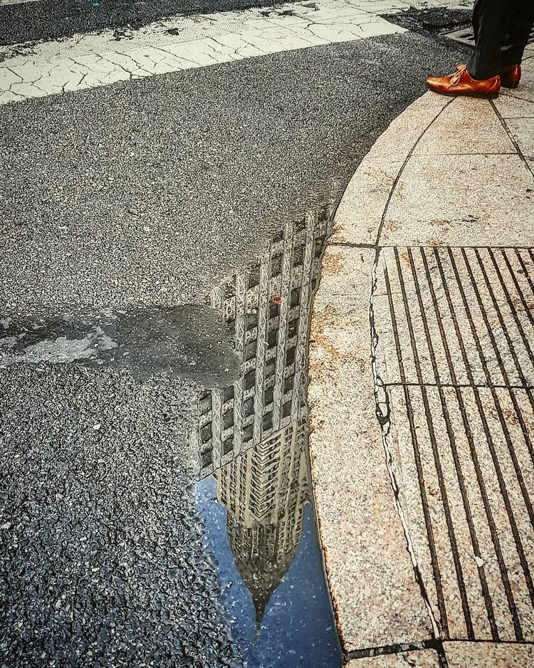 Reflection of Empire State Building, Midtown, Manhattan.