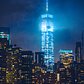Turris Lucis | Standing on the edge of the East River in Brooklyn, I watched a storm pass over Manhattan. From here you could see One World Trade Center grazing the clouds as its glow illuminated the city sky.