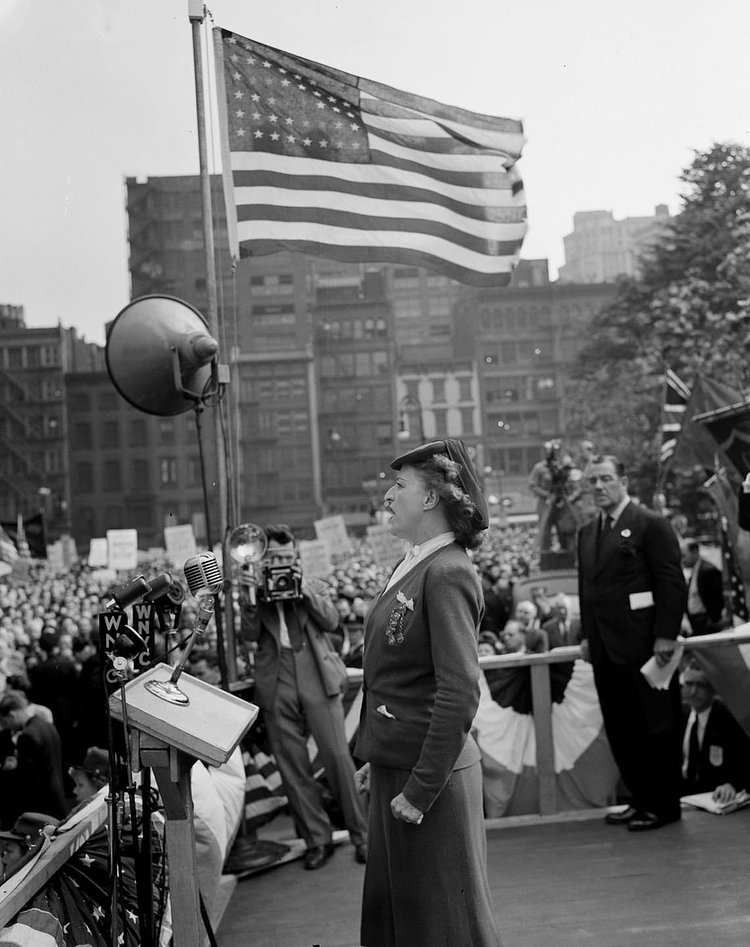 A speaker addresses the crowds in Madison Square