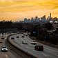 Overpass in Maspeth, Queens with Lower Manhattan skyline in the backround.