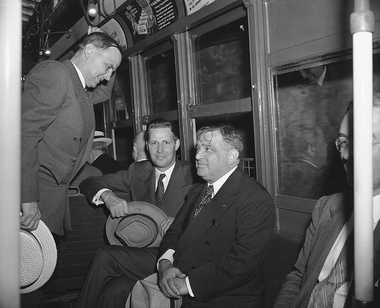 Mayor John F. Carr of Medford, Mass., Mayor Maurice J. Tobin of Boston, and Mayor Fiorello La Guardia of New York, left to right, take a subway to go from City Hall to their hotel for lunch in New York, Aug. 5, 1942, after conferring with mayors of Atlantic Coast cities on gasoline and fuel problems for the northeast.