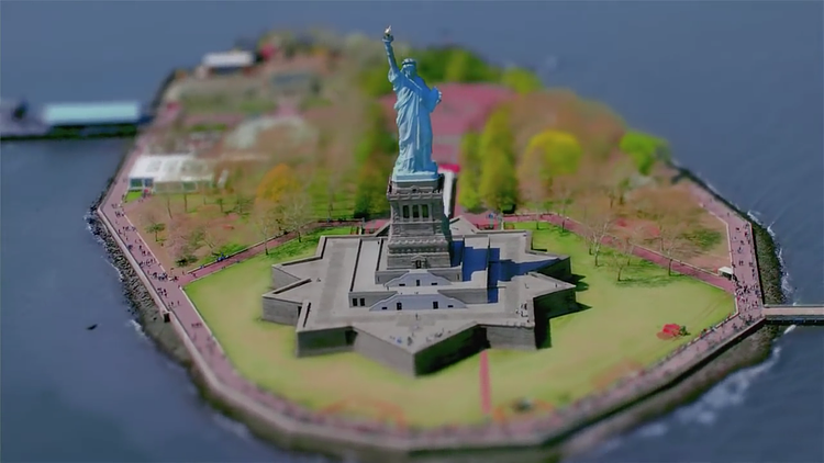 The iconic Statue of Liberty makes an appearance 15 seconds into the video. Access to the statue was reopened in 2009 following a 2001 closure due to the September 11 attacks. Gustave Eiffel's statue was gifted to the United States from the people of France in 1886 and has remained a major tourist attraction. 