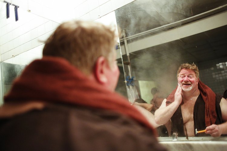 Rich Trince shaves at the bathhouse on a Boris week. Mr. Trince, 50, has been visiting the baths for 20 years.