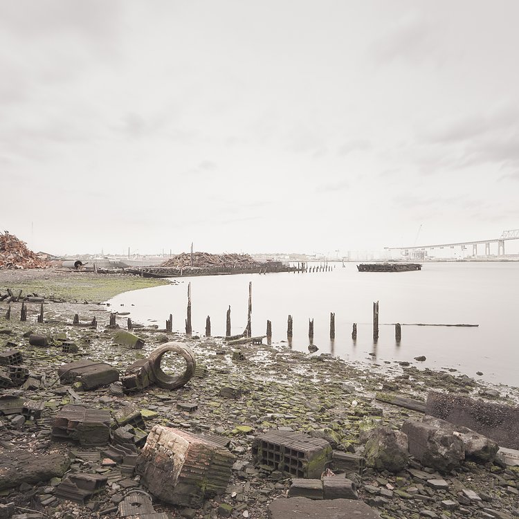 The remains of the Atlantic Terra Cotta Company factory line the shores of the Arthur Kill at the end of Ellis Street.